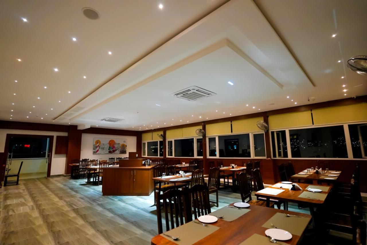 Hotel Sunrise Hospitality Vijayawāda Extérieur photo